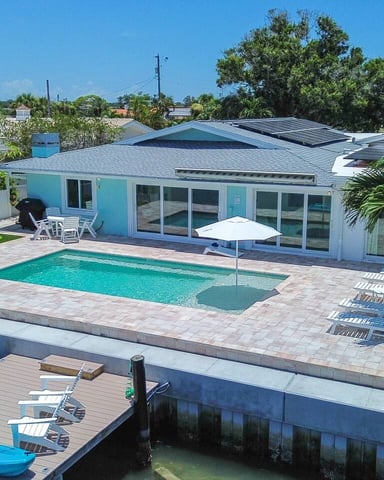 Aerial view of pool and dock